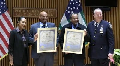 Axel and Kenny Dodson, retired New York Police Department officers, were presented with the Outstanding Citizens Award in New York City for saving a historic site in Atlanta from an arsonist.