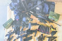 Police say they found these weapons, ammo, and gear in the suspect's vehicle.
