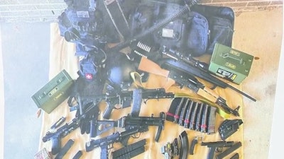 Police say they found these weapons, ammo, and gear in the suspect's vehicle.