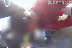 Jonesboro, Arkansas, police officer Troy Ellison pulls a child out of a frozen pond.