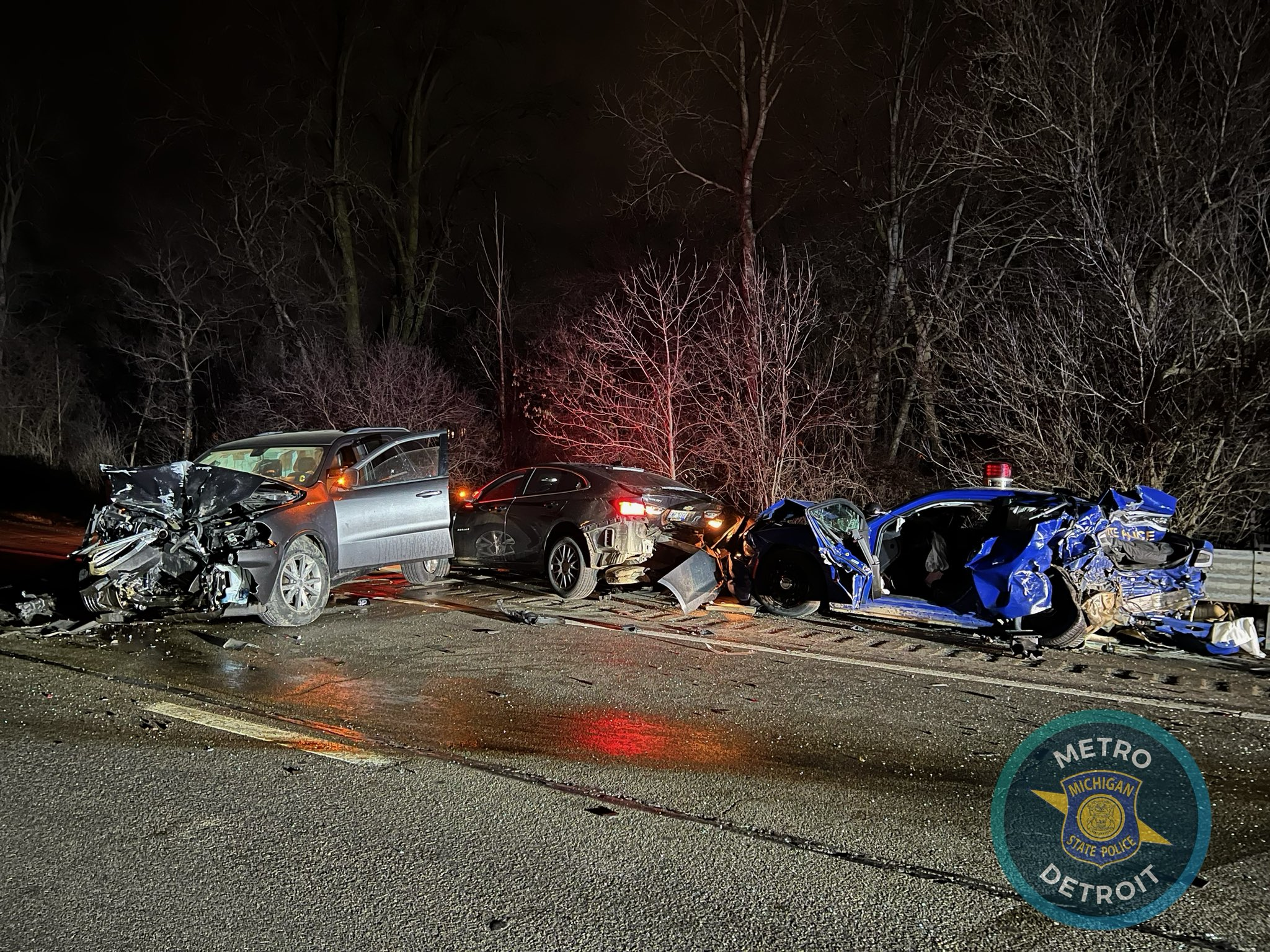 Michigan State Police said a 16-year-old driver hit the rear of a trooper's patrol vehicle and pushed it into the prisoner's vehicle in the Wednesday night crash.