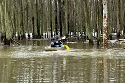 Michigan State Police officers used a rowboat Friday to capture a suspect who jumped in a river.