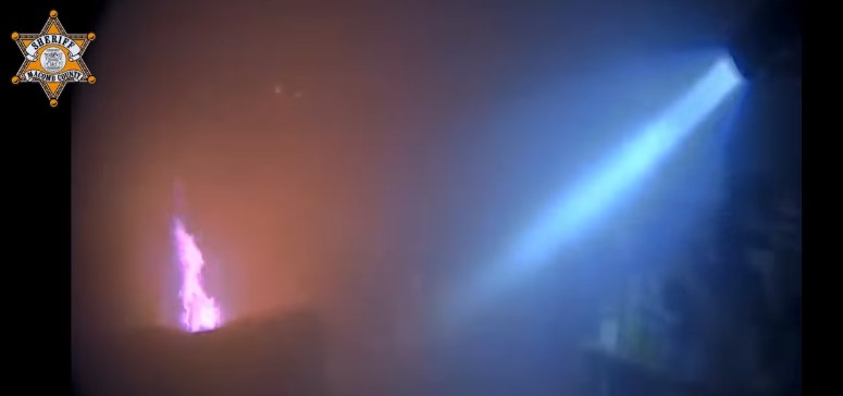 The scene that greeted Deputy Zachary Deng of the Macomb County Sheriff's Office as he entered the home.