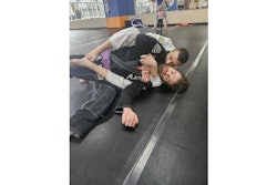 By establishing back control with the arrestee in the supine position, officers limit the arrestee's mobility and options, making it difficult for them to resist, access weapons, or attempt an escape.