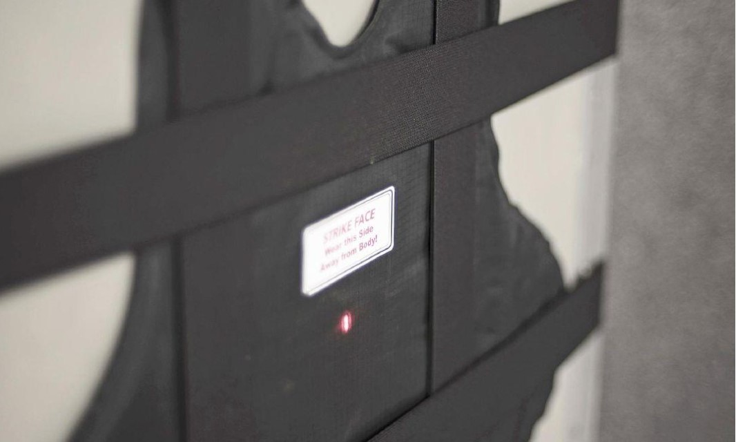 Testing a bullet-resistant vest. NIJ's ballistic armor evaluation standard specifies the conditioning of the armor before it is shot, where it is shot, and what rounds are to be used.