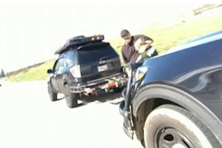 A Fontana, California, police officer under attack during a February traffic stop. The suspect was shot by another officer.