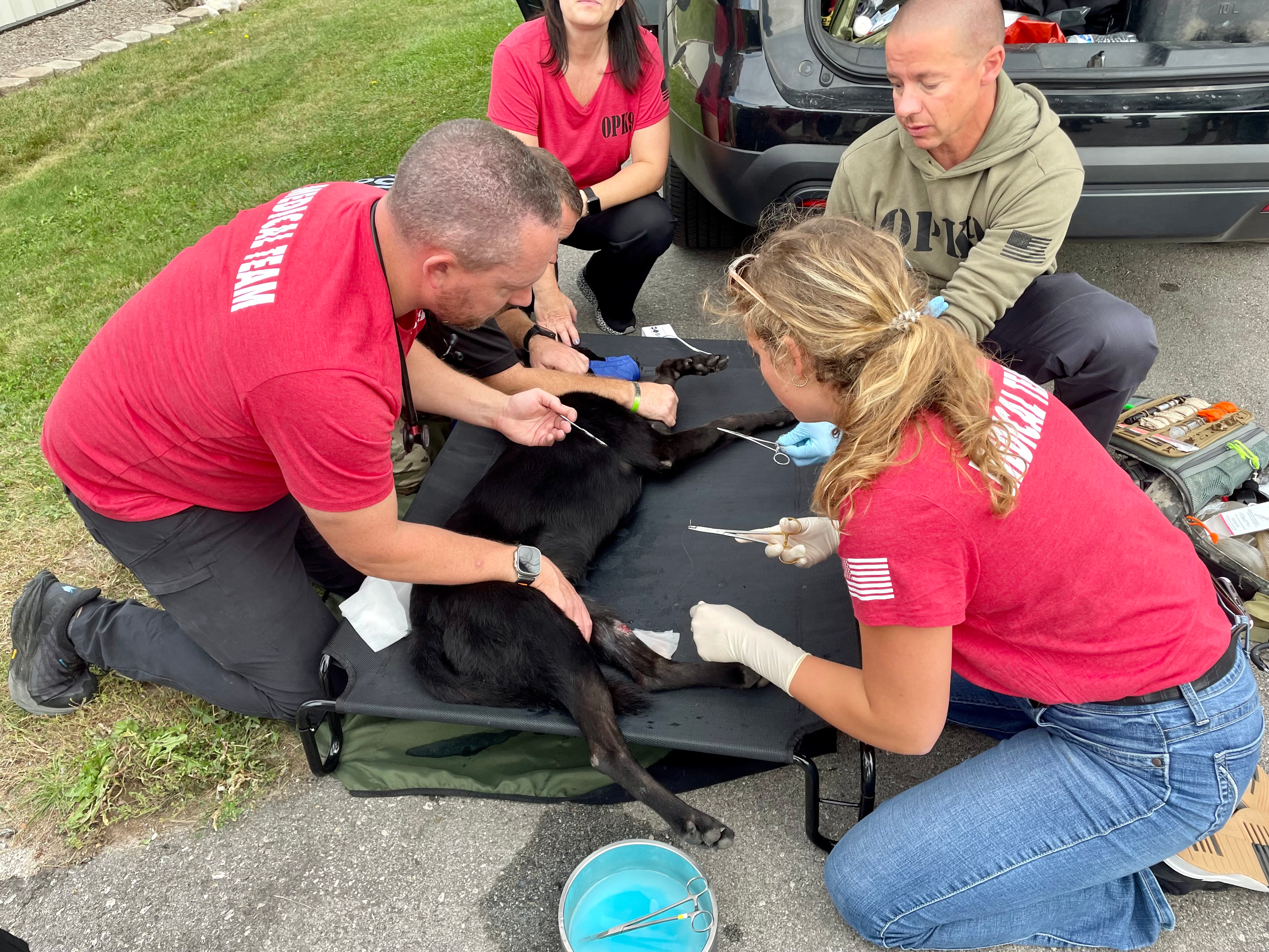 The Operational K9 Medical Team teaches students how to handle emergency situations with K9s.