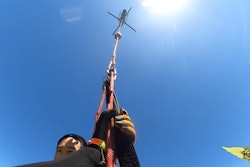 Marin County, California, Sheriff's deputies helicopter into Tomales Bay to rescue four people from an overturned boat.