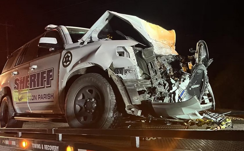 Patrol vehicle of Sergeant John O'Hern is removed from the accident scene. The Washington Parish Sheriff's Office deputy was seriously injured in the Thursday night crash.