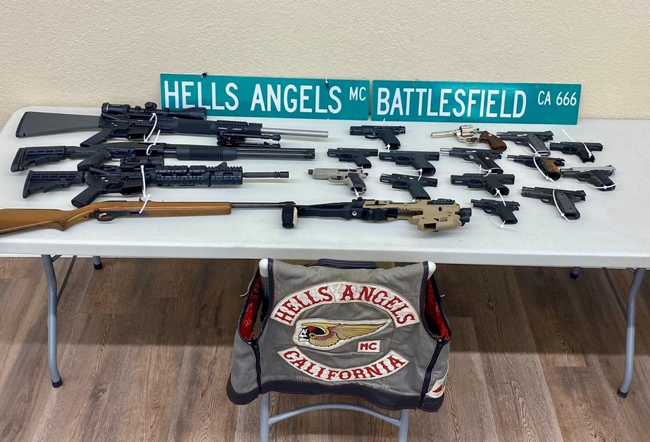 Weapons and regalia seized by law enforcement during arrests of Hells Angels members in Bakersfield, California.