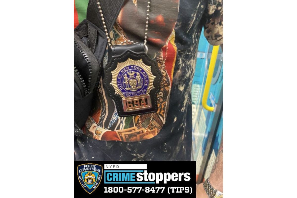 The NYPD says a man posed as a detective in the subway system using this badge and pepper sprayed a rider.