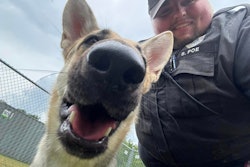 Indianapolice Metropolitan Police Department Public Safety Officer Poe and his new best friend Amy.