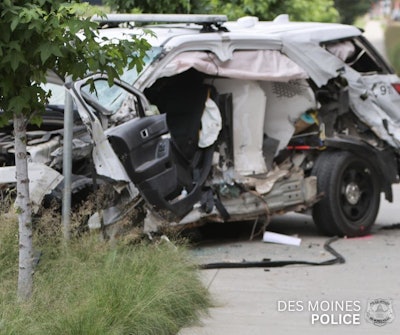 Des Moines Police Officer Dao Meunsaveng was hit head-on by a pickup truck Tuesday. Firefighters had to cut him and his K-9 partner Berro from the patrol SUV.