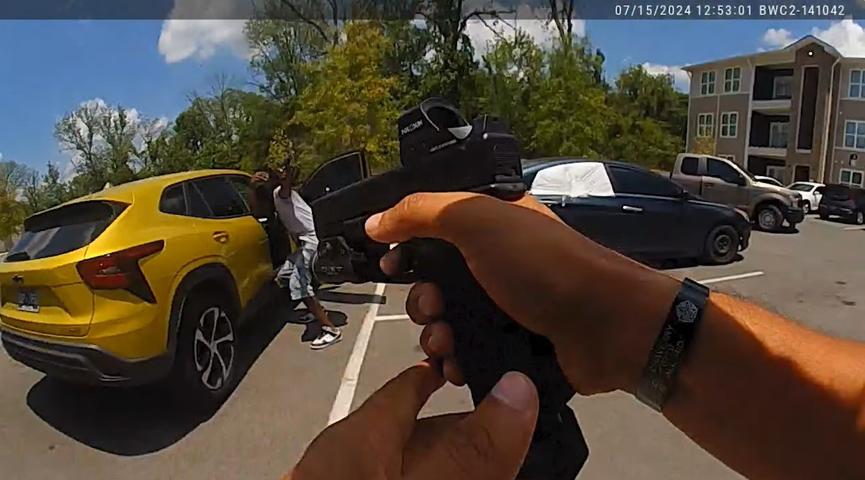 Metro Nashville Police Detective Carlos Diaz and murder suspect Miqueal Williams exchange fire in an apartment parking lot. The detective suffered a leg wound.