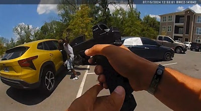 Metro Nashville Police Detective Carlos Diaz and murder suspect Miqueal Williams exchange fire in an apartment parking lot. The detective suffered a leg wound.