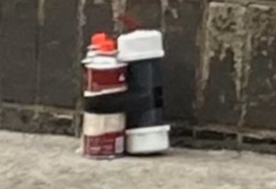 Explosive device removed from a vehicle outside the 25th Precinct stationhouse by the NYPD bomb squad.