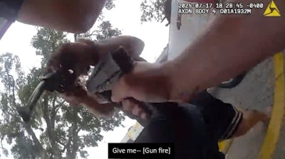 A Jacsksonville Officer shoots a suspect charging at him with a pistol during an encounter July 16 at a gas station.
