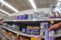 Corporal Hunter Willougby of the Miami Township (Ohio) Police Department shops for formula to help a desperate mother feed her newborn.