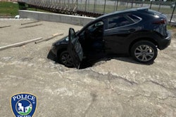 An Oregon bank robbery suspect tried to escape a police pursuit by driving through a construction site and crashed into a hole.