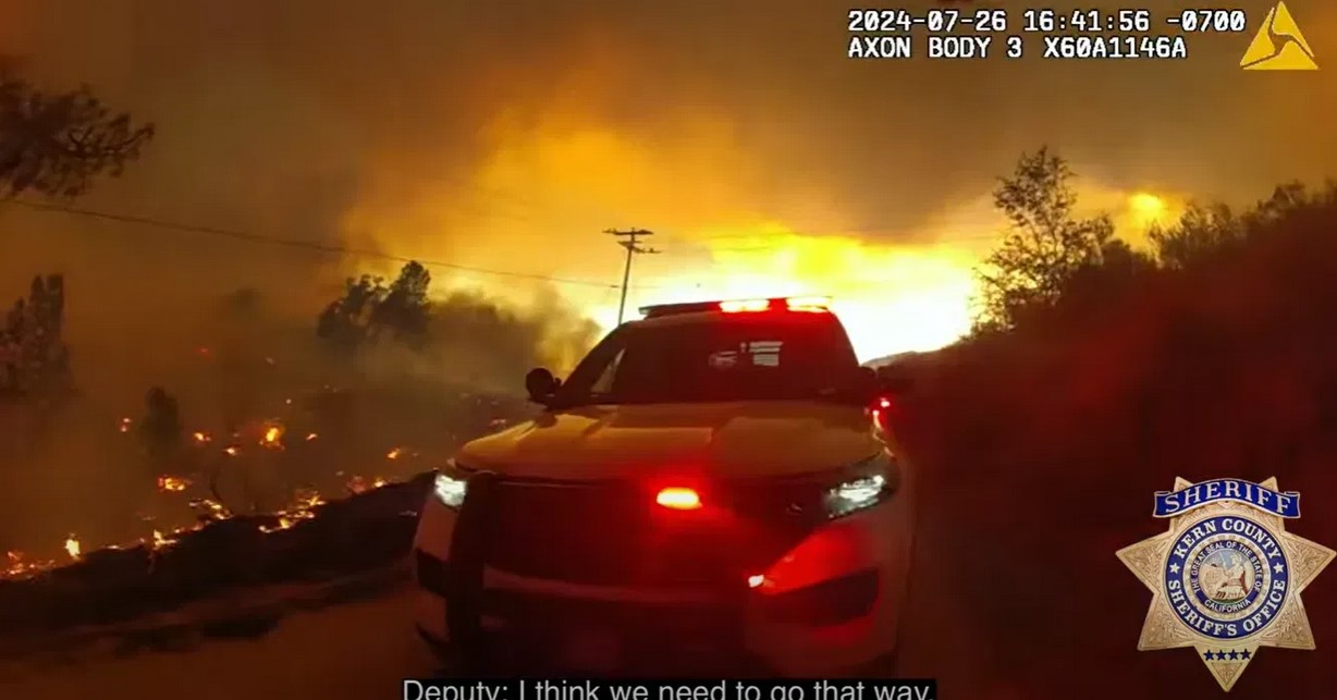 Still image from Kern County (California) Sheriff's Office showing deputies surrounded by Borel Fire.
