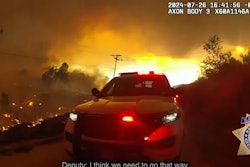 Still image from Kern County (California) Sheriff's Office showing deputies surrounded by Borel Fire.