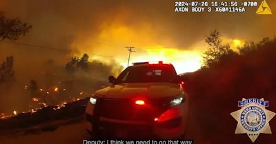 Still image from Kern County (California) Sheriff's Office showing deputies surrounded by Borel Fire.