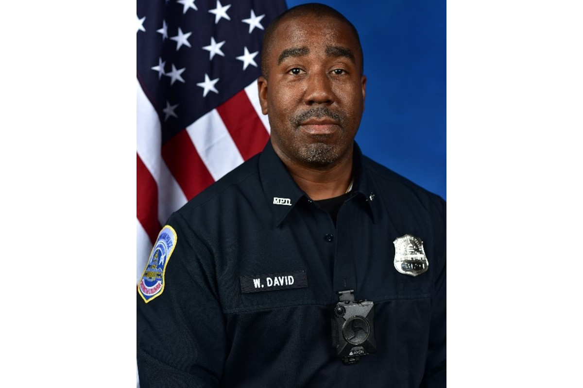 Investigator Wayne David of the Metropolitan Police Department of the District of Columbia was killed Wednesday night when a gun he was retrieving from a storm drain discharged.