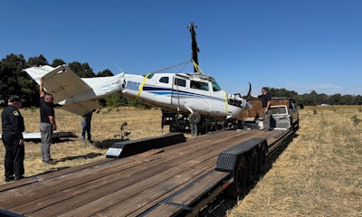 The Sacramento County Sheriff’s Office plane that crash landed Thursday is shown being removed from where it made the emergency landing.