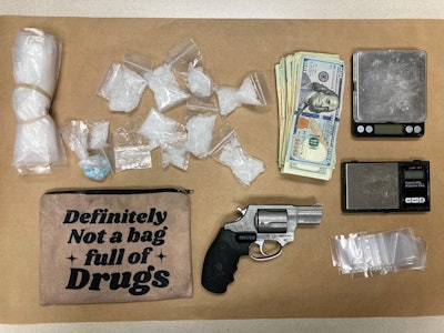 Portland Police found these items Tuesday inside a suspected stolen vehicle. The driver and passenger were arrested.
