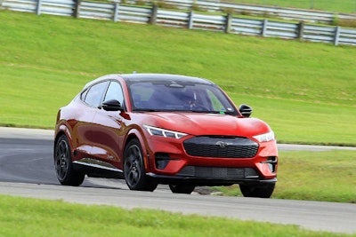 A trooper from the Michigan State Police Precision Driving Unit puts a 2024 Ford Mustang Mach-E through its paces during testing.