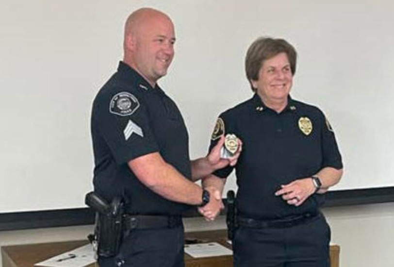Biddeford, Maine, Police Sgt. Jacob Wolterbeek with Chief JoAnne Fisk. Wolterbeek was killed in a crash driving home from work Thursday.