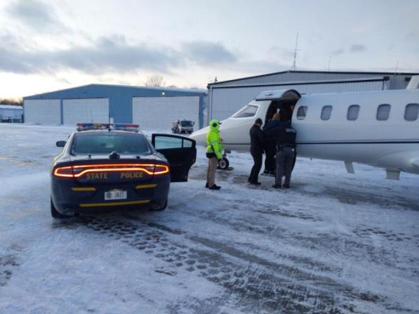 New York State Police troopers transported a stranded heart patient to an airport where she was flown to the Cleveland Clinic for transplant surgery.
