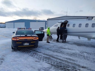 New York State Police troopers transported a stranded heart patient to an airport where she was flown to the Cleveland Clinic for transplant surgery.