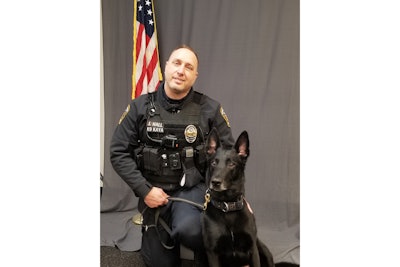 Streetsboro, Ohio, Police K-9 Kaya with his handler Officer Jason Hall. Kaya died on duty Tuesday.
