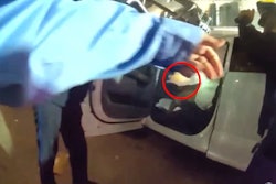 New Orleans Police officers respond to the New Year's Day 2025 terror attack. Red circle shows suspect inside pickup truck used to mow down revelers. The suspect was killed in an exchange of fire with officers.