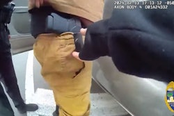 Jacksonville Police Officer Mindy Cardwell reaches for the pistol carried by Jason Arrington. Trying to take the pistol from the holster led to an accidental discharge that wounded Arrington.