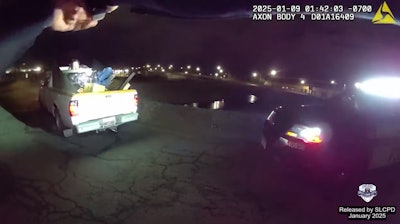 The man identified by police as Chandler Grillone jumped into the back of a pickup truck after the officer ordered him onto the ground.
