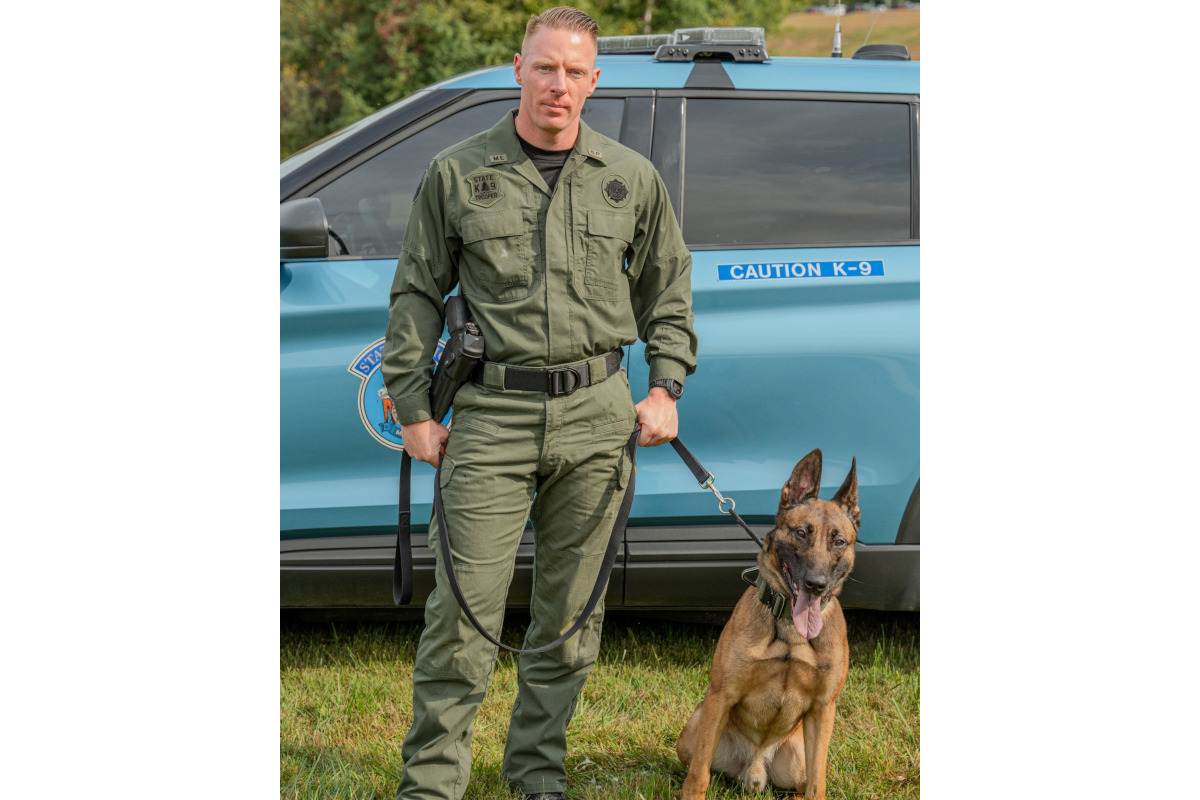 Maine State Police Sgt. Jonathan Russell with K-9 Preacher. Preacher was shot and mortally wounded during a tactical operation Monday.