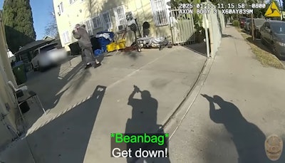 Screen grab from LAPD video shows officers responding to knife-wielding suspect outside residential treatment center.