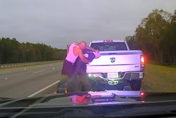 Screen shot from dashcam video showing Camden County sheriff’s Staff Sgt. Buck Aldridge assaulted by Leonard Allen Cure.