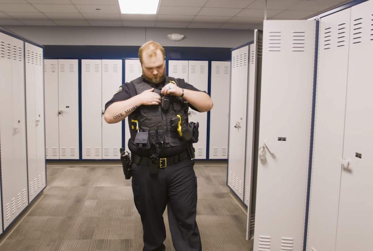 Officer Tyler Hawes of the Fargo Police Department prepared to go on duty for the first time in 18 months. Officer Hawes was critically wounded by a gunman who killed another officer on July 14, 2023.