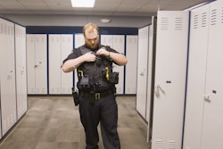 Officer Tyler Hawes of the Fargo Police Department prepared to go on duty for the first time in 18 months. Officer Hawes was critically wounded by a gunman who killed another officer on July 14, 2023.