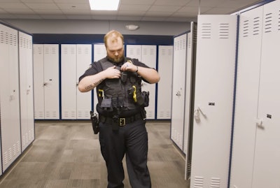 Officer Tyler Hawes of the Fargo Police Department prepared to go on duty for the first time in 18 months. Officer Hawes was critically wounded by a gunman who killed another officer on July 14, 2023.