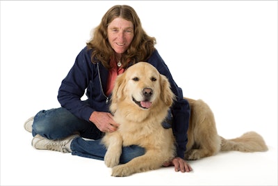 Mary Cortani, founder of Operation Freedom Paws, with her dog, CJ.