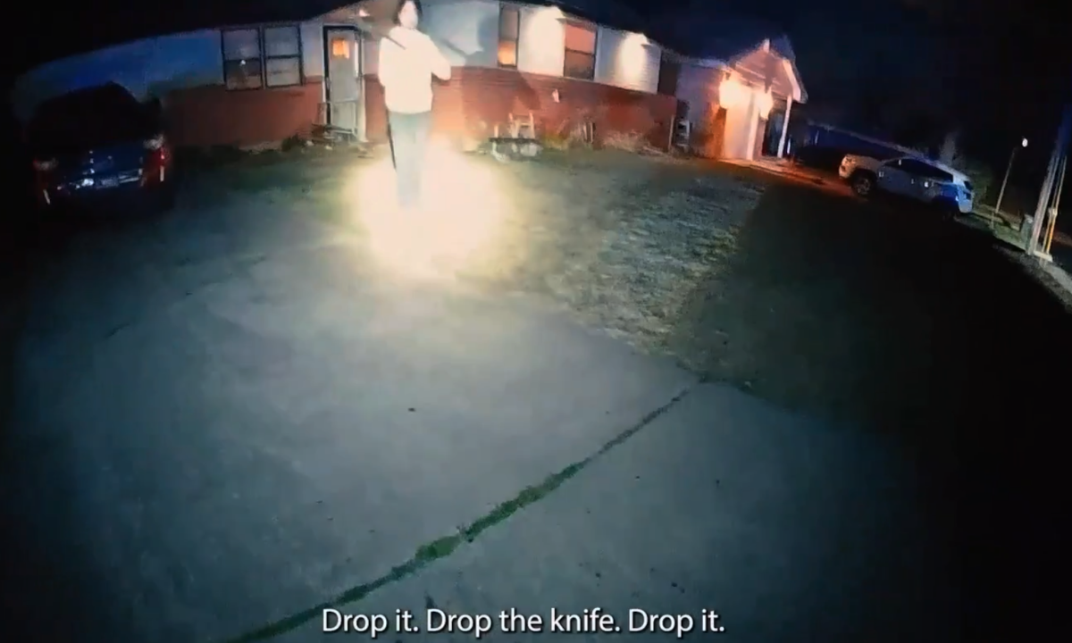 Body-worn video shows a man armed with a machete approaching police officers, who ultimately fired on the man.