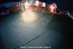 Body-worn video shows a man armed with a machete approaching police officers, who ultimately fired on the man.