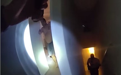 Still image from body camera video show a Hillsborough County Sheriff's deputy confronting an armed man before an officer-involved shooting in Riverview, Florida.
