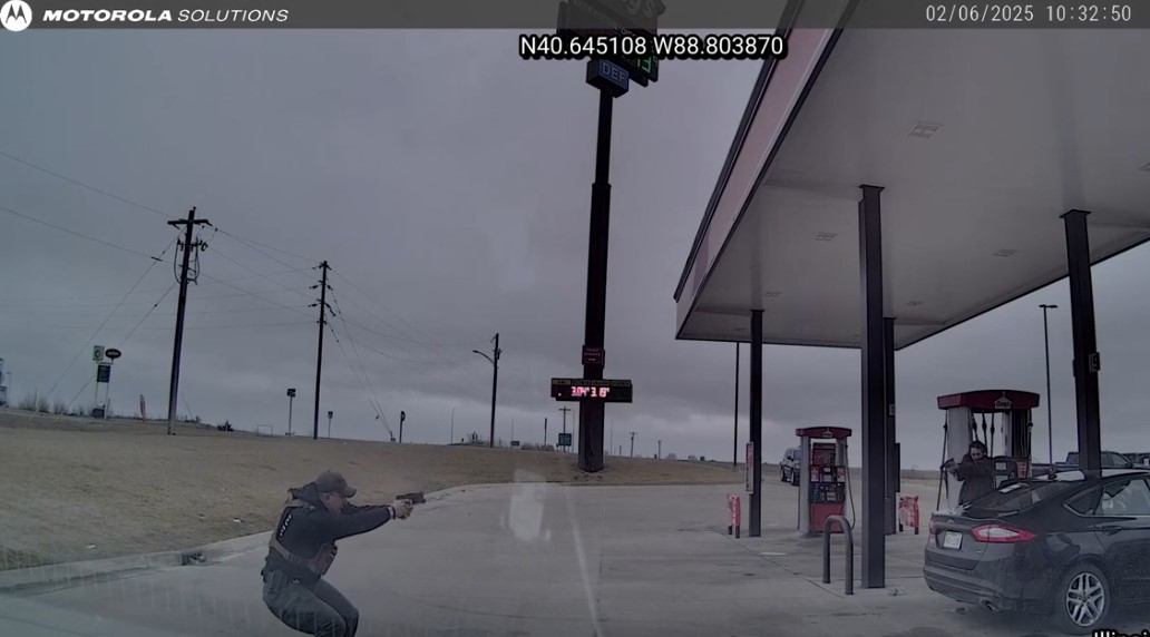 Officer aims at robbery suspect during Feb. 6 shootout.