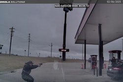 Officer aims at robbery suspect during Feb. 6 shootout.