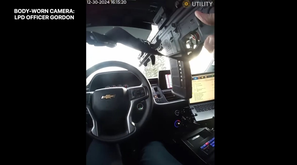 A Lawrence, Indiana, Police officer fires a rifle through his own windshield during a vehicle pursuit where the suspect opened fire on him.